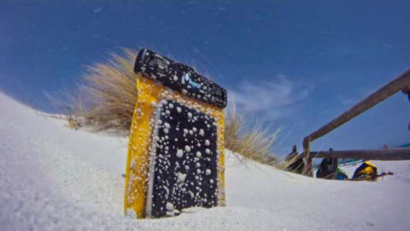 iPhone waterproof case on the beach